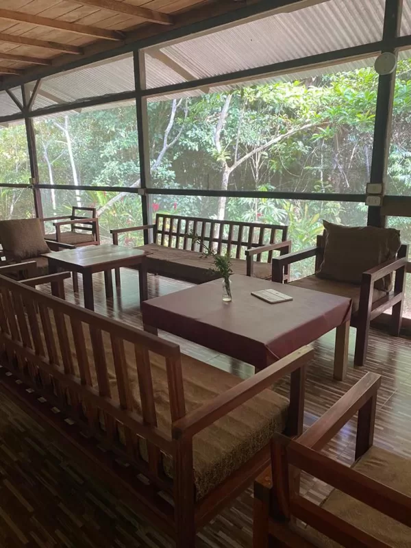 Cozy reading and relaxation corner in a jungle lodge in the Amazon rainforest of Peru, wit